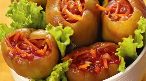 Stuffed peppers in tomato juice for the winter