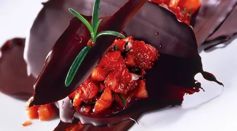 Chocolate millefeuille with strawberries and rosemary