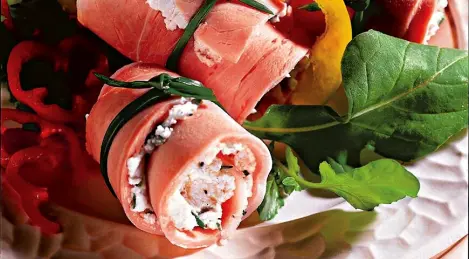 Pieces of ham with goat cheese