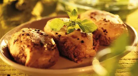 Chicken breasts on a mushroom bed