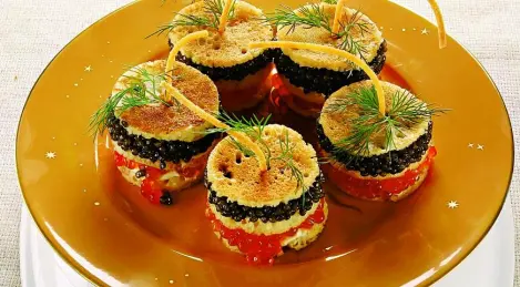 Canape fritters with red and black caviar