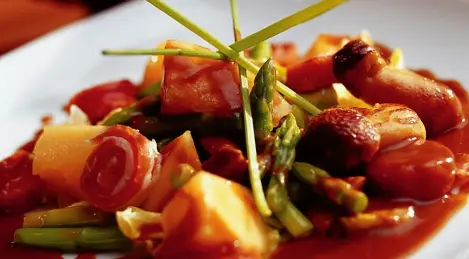 Salad of asparagus with jamon and melon "cantaloupe"