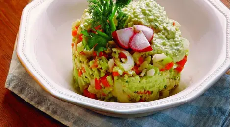 Young fresh vegetables with avocado sauce