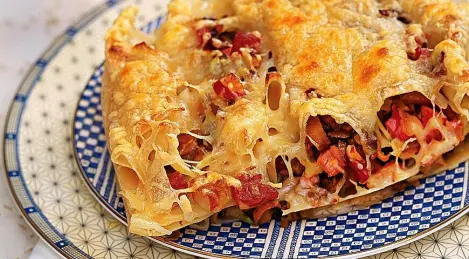 Cannelloni stuffed with mushrooms and ham