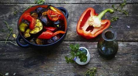 Baked eggplant with peppers and onions