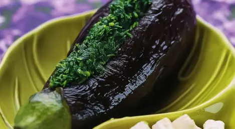 Eggplant stuffed with herbs