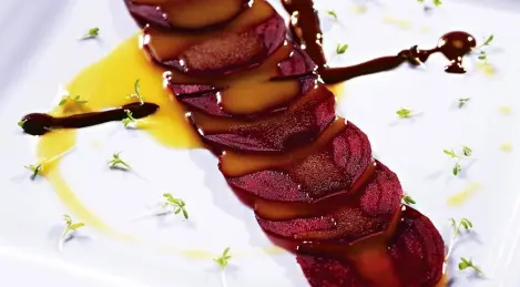 Beetroot carpaccio with passion fruit emulsion and dark chocolate