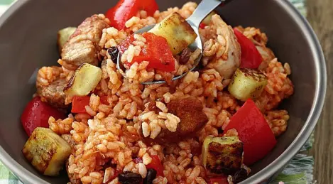 Pork with chicken and Caribbean-style rice