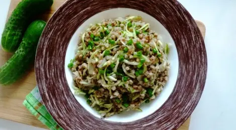 Buckwheat with cucumber and onion