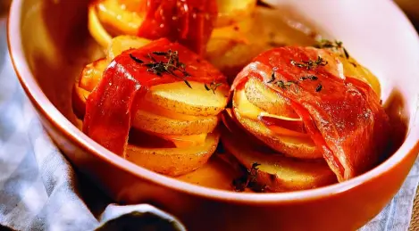 Potato sandwiches with smoked cheese and ham