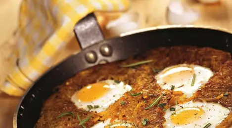 Fried eggs on potatoes