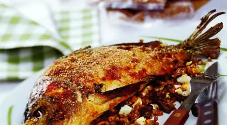 Fish with buckwheat and mushrooms