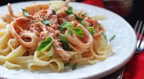 Fettuccine with crab and squid sauce