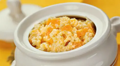 Millet porridge with pumpkin in a pot