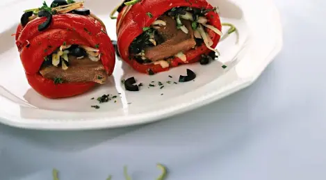 Tongue wrapped in baked bell pepper