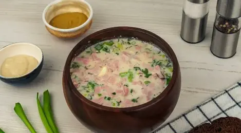 Okroshka on kefir with boiled sausage