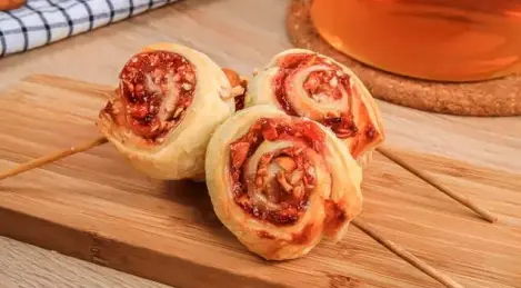 Puff pastry curls on a stick