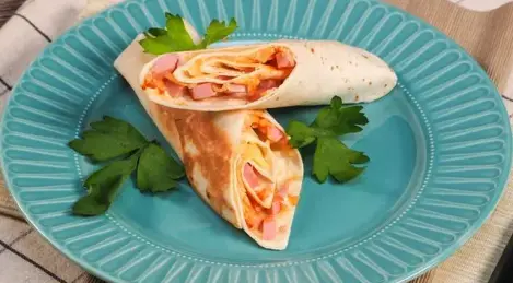 Fried lavash with sausage and cheese