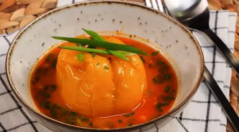 Stuffed peppers in sour cream and tomato sauce
