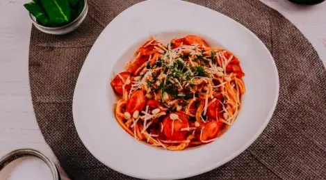 Pasta with sausages in tomato sauce