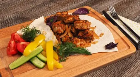 Pork shashlik with pickled onions
