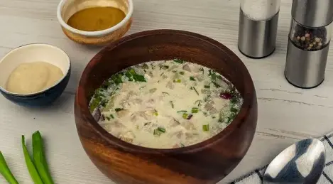 Okroshka with water and mayonnaise and ham