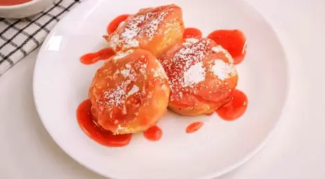 Rice Pudding with Strawberry Sauce