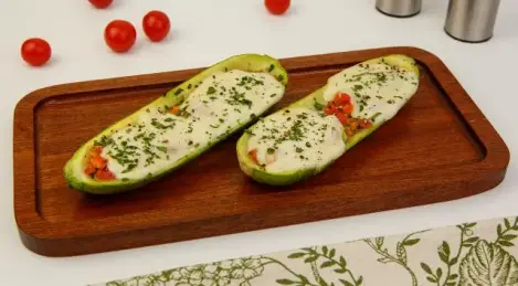 Baked zucchini with tomatoes and herbs