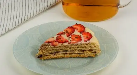 Waffle cake with condensed milk and berries