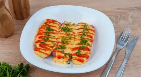 Salsicce con formaggio al forno