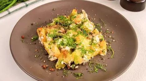 Potatoes baked with mushrooms and mayonnaise
