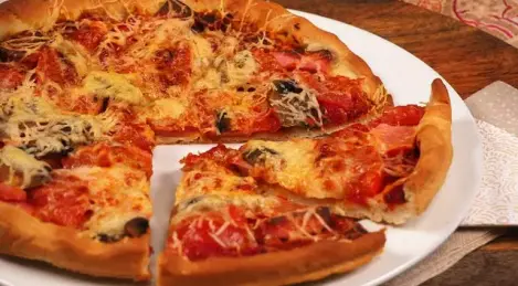 Pizza with mushrooms and sausage