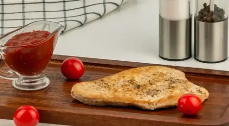 Dinde à la sauce tomate